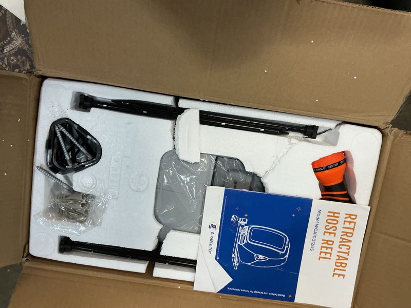 Condition photo showing Good Condition for giraffe tools retractable hose reel with 1/2 inch x 100ft, heavy duty ground mount garden hose reel, automatic rewind,with 9-function sprayer nozzle & flexible swivel base 100 ft 1/2 inch