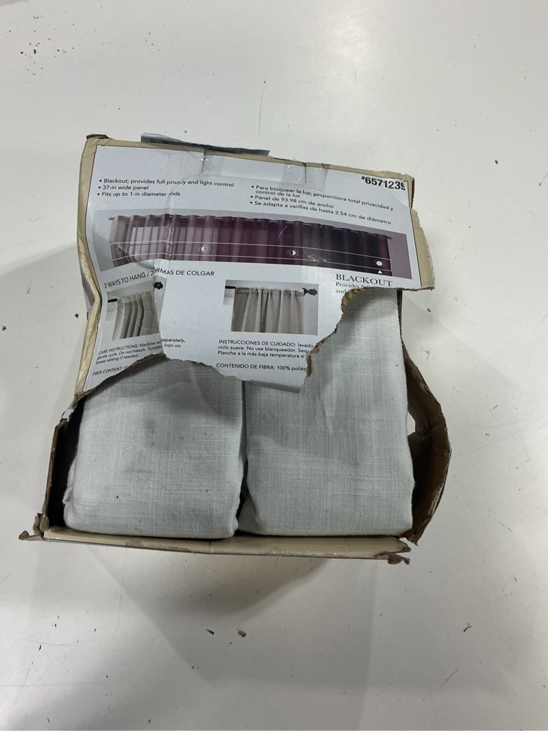 Condition photo showing As Is for allen + roth 63-in ivory blackout interlined back tab curtain panel pair