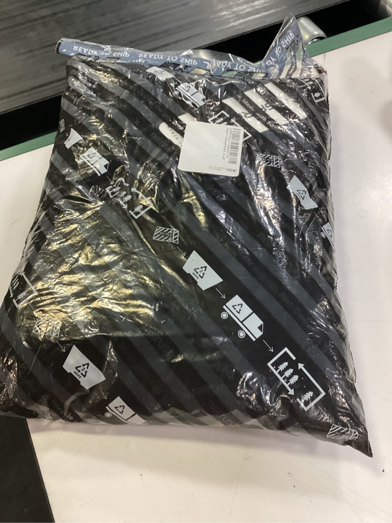 Condition photo showing New/Like New for garneau women's oversized fit variant pants, black, small