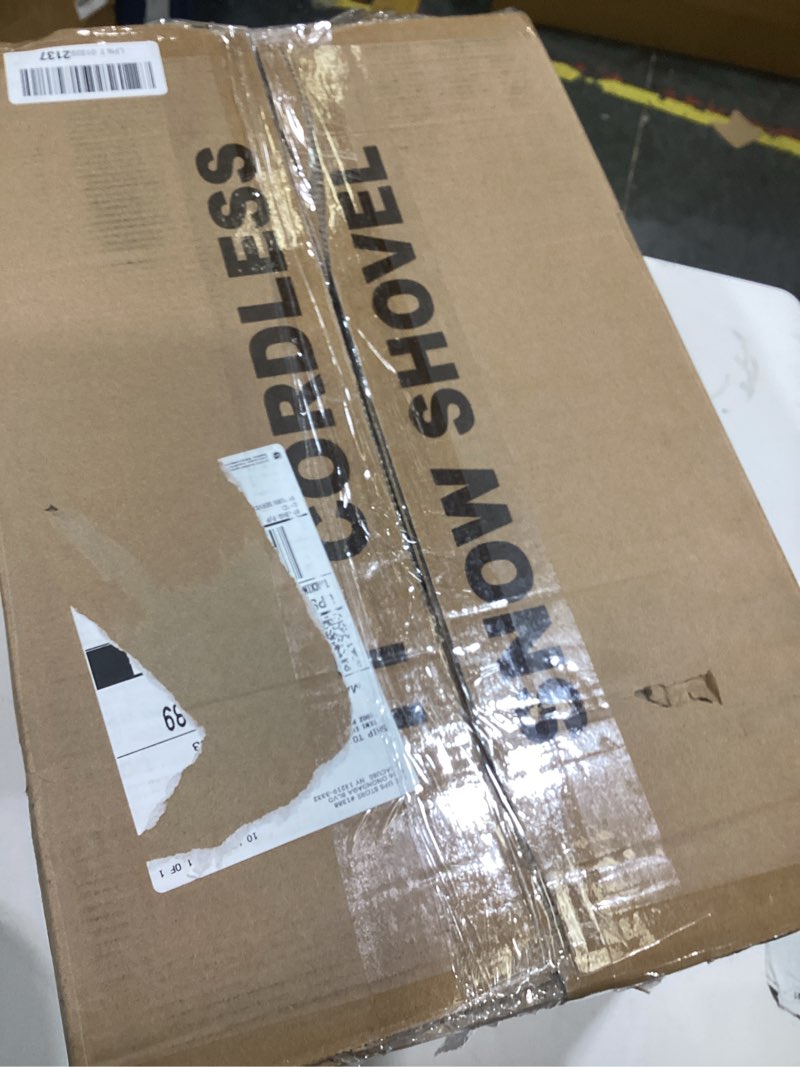 Condition photo showing As Is for 11” cordless snow shovel