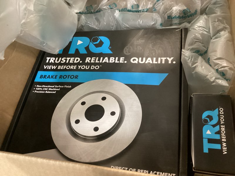 Condition photo showing New/Like New for TRQ Rear Brake Pad and Rotor Set Ceramic Compatible with 2018 Mini Cooper Countryman