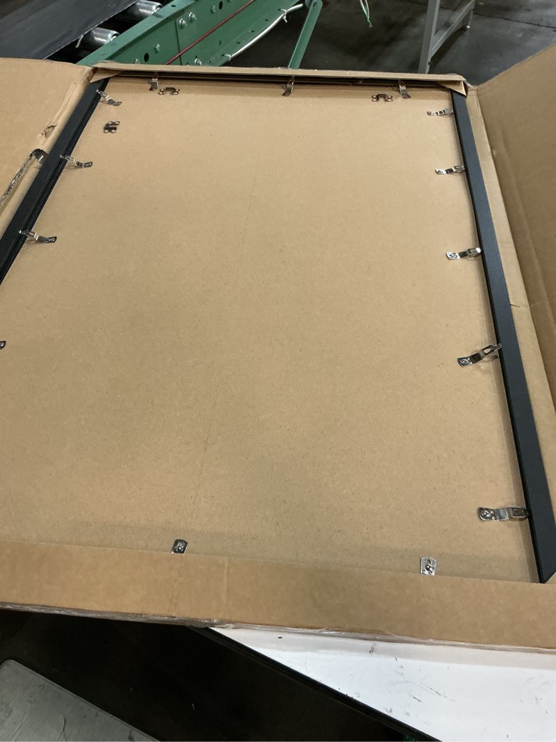 Condition photo showing Good Condition for a plus max 24x36 picture frame black light weight wall mount | 24 x 36 inch black wood-grain engineered wood material frame for 24by36 rectangular photo poster - 1 pack/black/24x36 black 24x36 1 pack