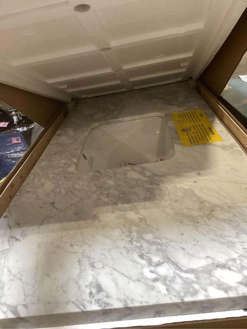 Condition photo showing Good Condition for  allen + roth carrara 49-in x 22-in white natural marble undermount single sink widespread