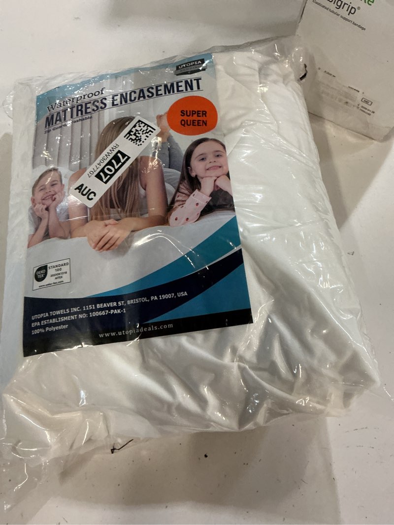 Condition photo showing New/Like New for utopia bedding queen mattress protector zippered, 100% waterproof bed bug and dust mite proof mattress encasement, absorbent 6 sided mattress cover