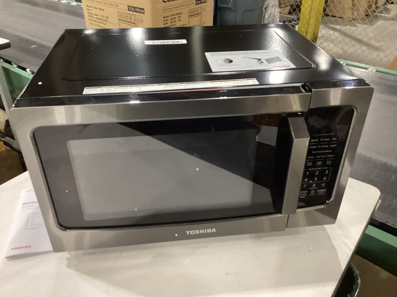 Condition photo showing As Is for *Not Tested* TOSHIBA ML-EM45P(BS) Countertop Microwave Oven with Smart Sensor and 13.6\" Removable Position Memory Turntable, Sound On/Off Function, 1200W, 1.6 Cu.ft, Black Stainless Steel Sensor-1.6 Cu.Ft…. Missing turntable 