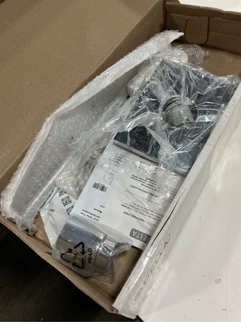 Condition photo showing As Is for (incomplete)delta faucet vero 14 series single-function shower trim kit with single-spray touch-clean rain shower head, chrome t14253 (valve not included) chrome without rough