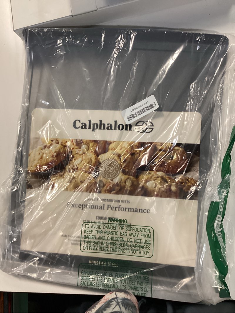 Condition photo showing New/Like New for calphalon titan steel core pfa free nonstick 17 x 14 cookie sheet baking pan, heavy duty reinforced steel bakeware for even heating, oven safe baking tray for cookies titan steel core 17" x 14" cookie sheet