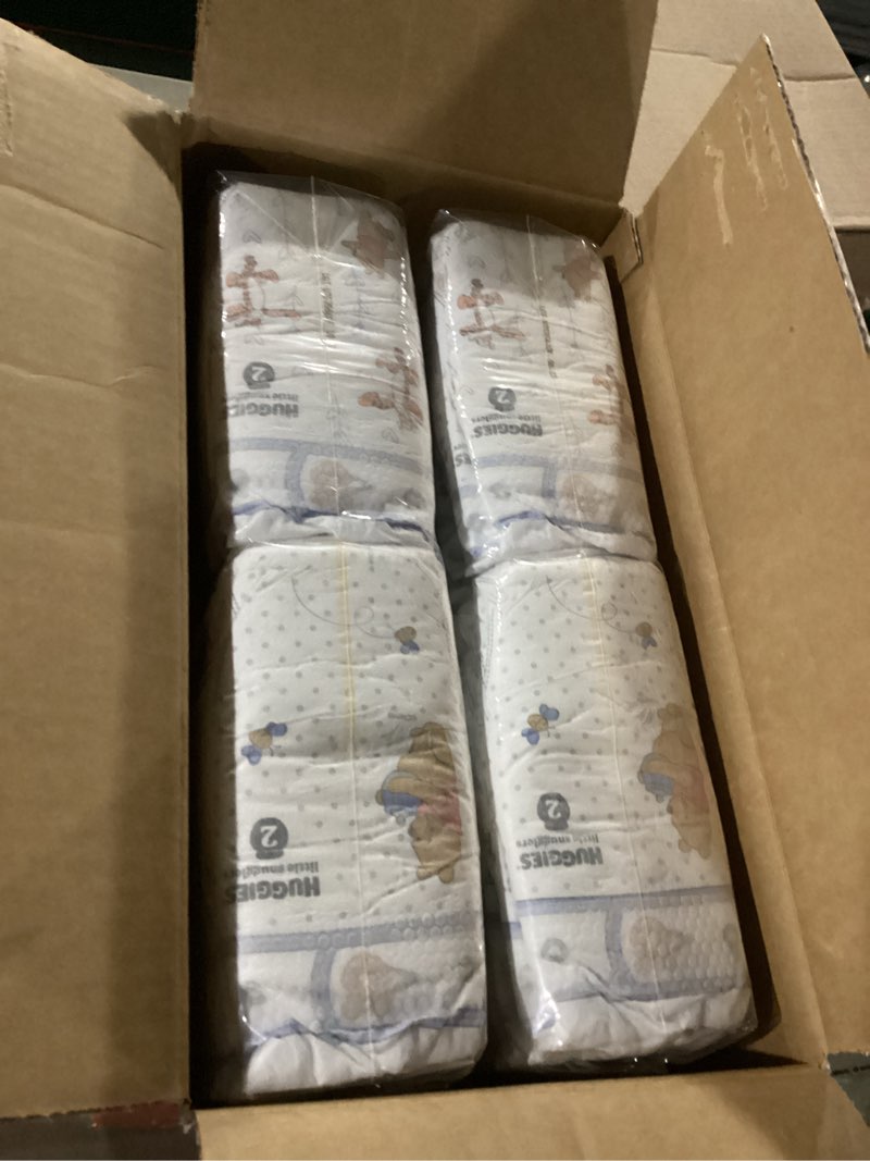 Condition photo showing New/Like New for Huggies Size 2 Diapers, Little Snugglers Baby Diapers, Size 2 (12-18 lbs), 148 Count, Packaging May Vary Size 2 148