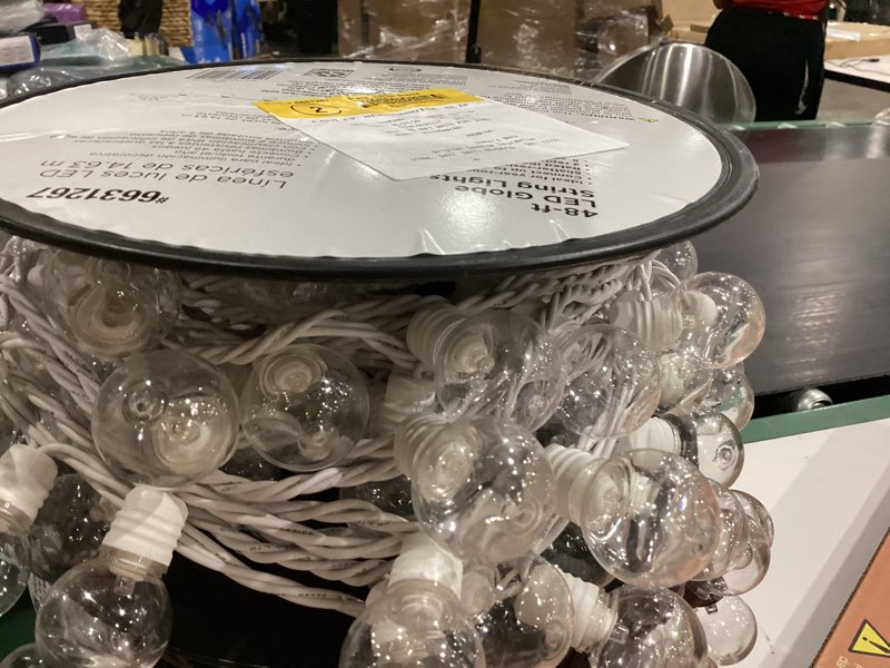 Condition photo showing As Is for harbor breeze 48-ft plug-in white indoor/outdoor string light with 100 white -light led globe bulbs