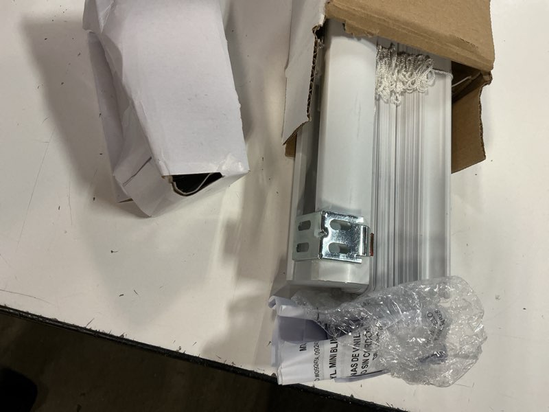 Condition photo showing As Is for magne blind 1-in slat width 25-in x 72-in cordless white vinyl room darkening mini-blinds