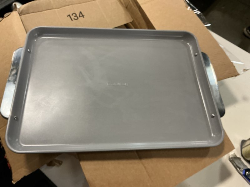 Condition photo showing As Is for 18 in.non-stick ceramic large baking sheet in gray