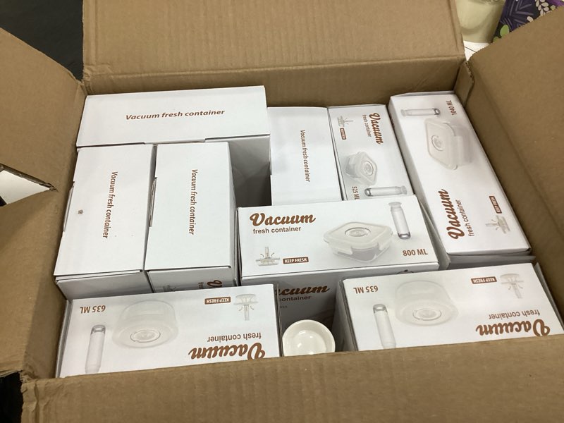 Condition photo showing New/Like New for FreshSeal - Glass Vacuum Sealable Container Set - 9 Pieces, 6 Sizes, Hand Pump, 10 Bags