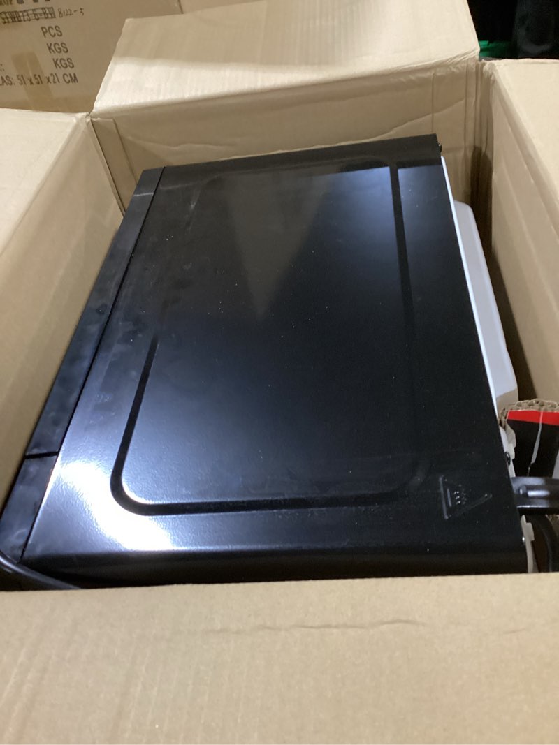 Condition photo showing New/Like New for FRIGIDAIRE 0.7 Cu. ft. New Countertop Microwave Oven - Black