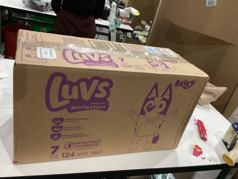 Condition photo showing New/Like New for luvs size 7 baby diapers, platinum protection bluey diapers for day & night, size 7, 124 count (pack