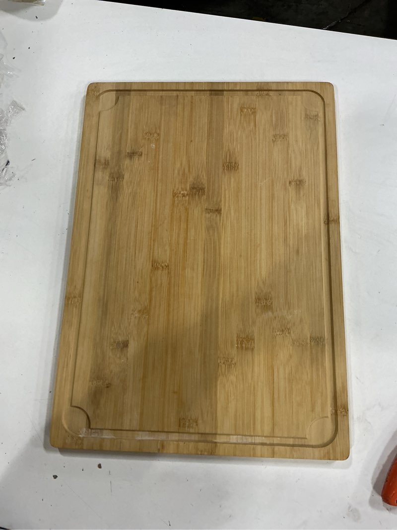Condition photo showing As Is for Thick Bamboo Cutting Board, Large Kitchen Chopping Board for Meat, 1.4" Thickened Heavy Duty Butcher Block Cutting Board with Juice Groove, for Cutting Meat, Bones and Vegetables, 100% Organic Bamboo