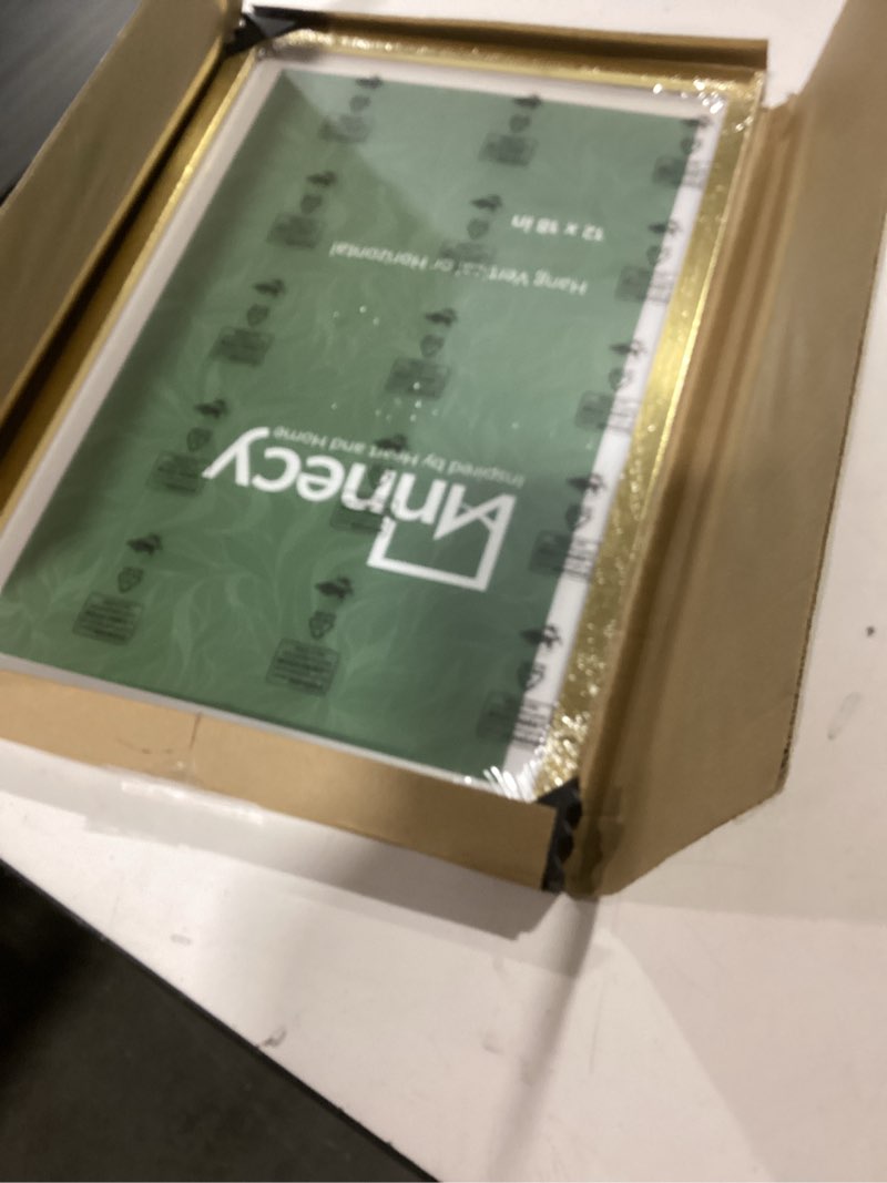 Condition photo showing New/Like New for Annecy 12x18 Picture Frame Gold?1 Pack?, 12x18 Frame for Wall Decoration, Classic Gold Minimalist Style Suitable for Decorating Houses, Offices, Hotels 12x18 Gold