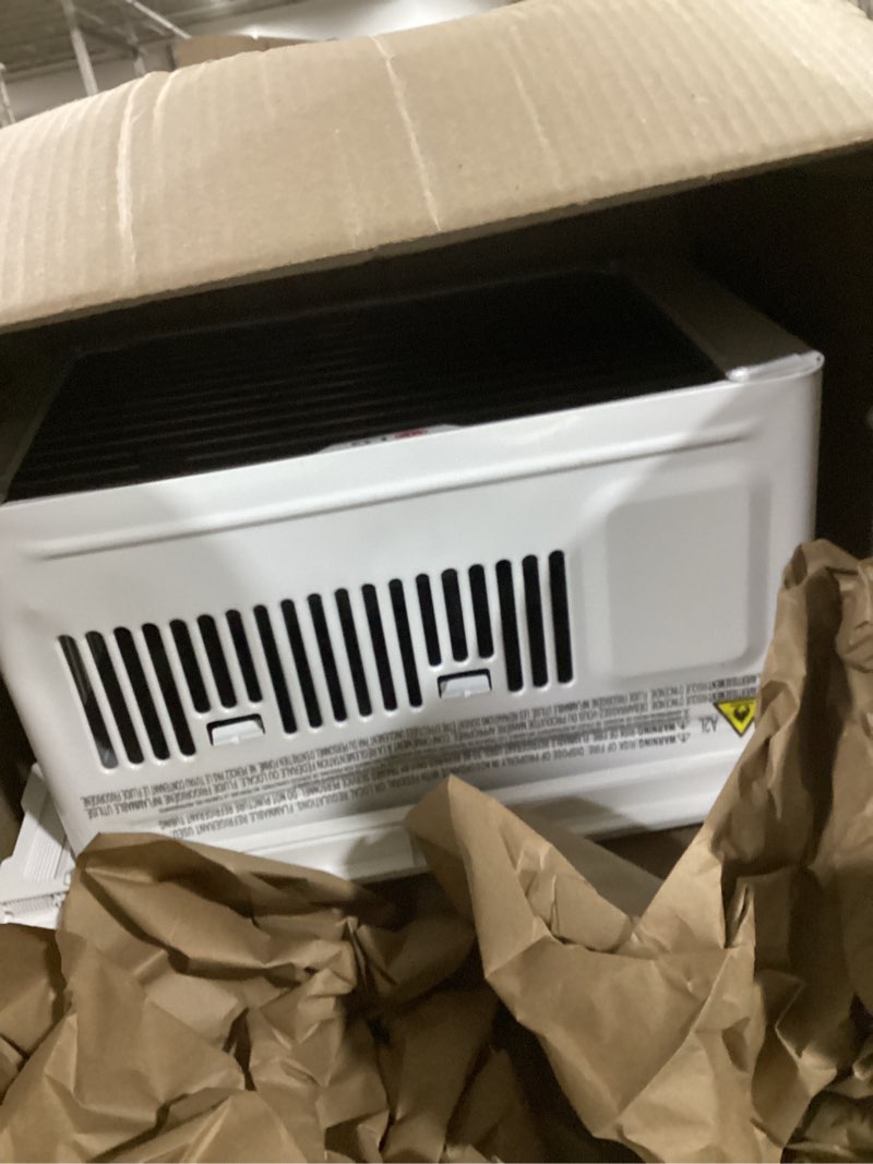 Condition photo showing As Is for (similar to )amazon basics 6000-btu window air conditioner with quiet operation, up to 250 sqf, cool and fan functions, washable filter, adjustable window kit, digital temperature display, remote control, white