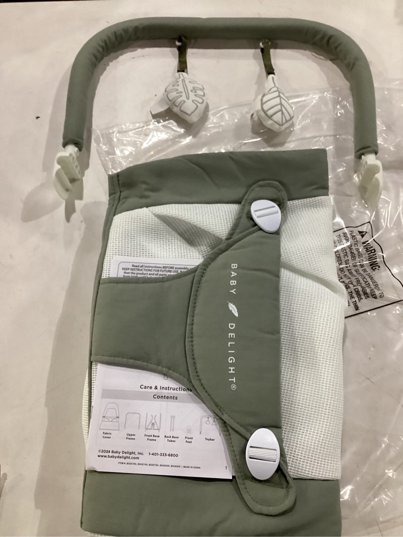 Condition photo showing New/Like New for baby delight alpine deluxe portable baby bouncer | infant | 0-6 months | 100% gots certified organic cotton fabric | organic sage deluxe organic sage