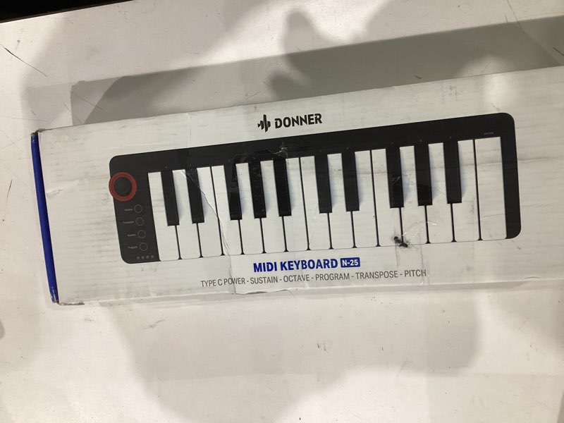 Condition photo showing As Is for donner mini midi keyboard, n-25 25 key midi controller with velocity-sensitive mini keys&light-up rocker and music production software included, small midi keyboard with 40 teaching courses n25 n-25