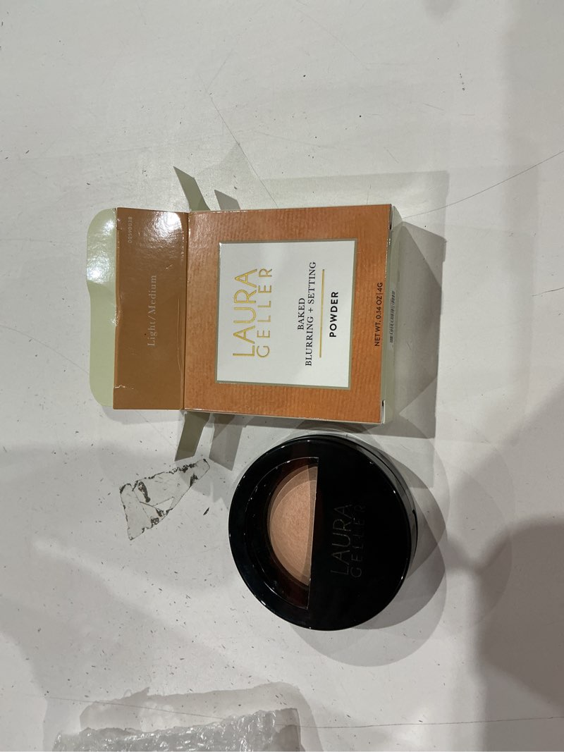Condition photo showing Good Condition for laura geller new york baked blurring + setting powder, translucent makeup setting powder for soft-focus finish, minimize fine lines and pores, light/medium