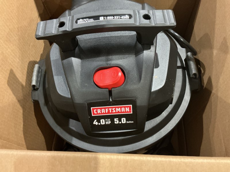 Condition photo showing As Is for craftsman 5-gallon 4-hp corded wet/dry shop vacuum with accessories included