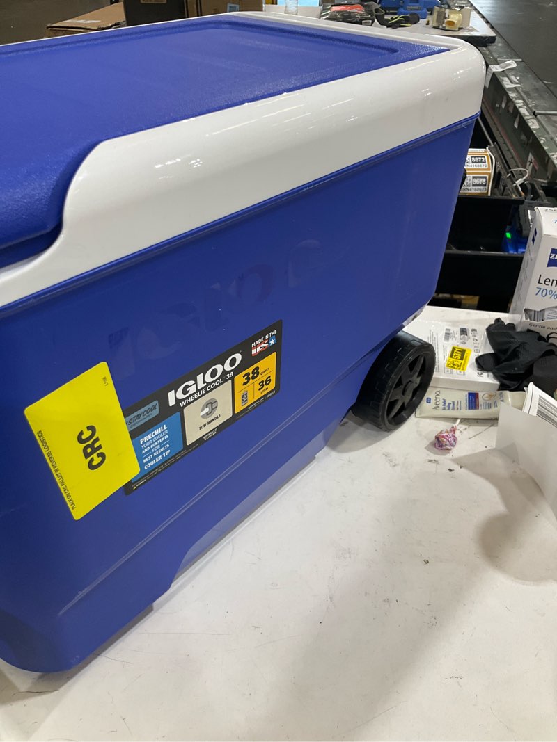 Condition photo showing As Is for igloo wheelie cool 38qt cooler - blue