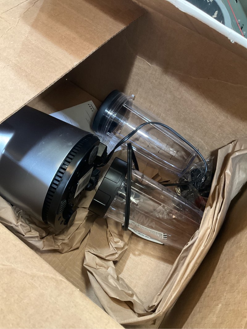 Condition photo showing As Is for ninja | blender | nutri pro | single serve | for smoothies, salsa, shakes and frozen drinks | includes 2 smoothie cups & lids | crushes ice, fruit & veggies |silver | bn401 auto blend 1000-peak-watts