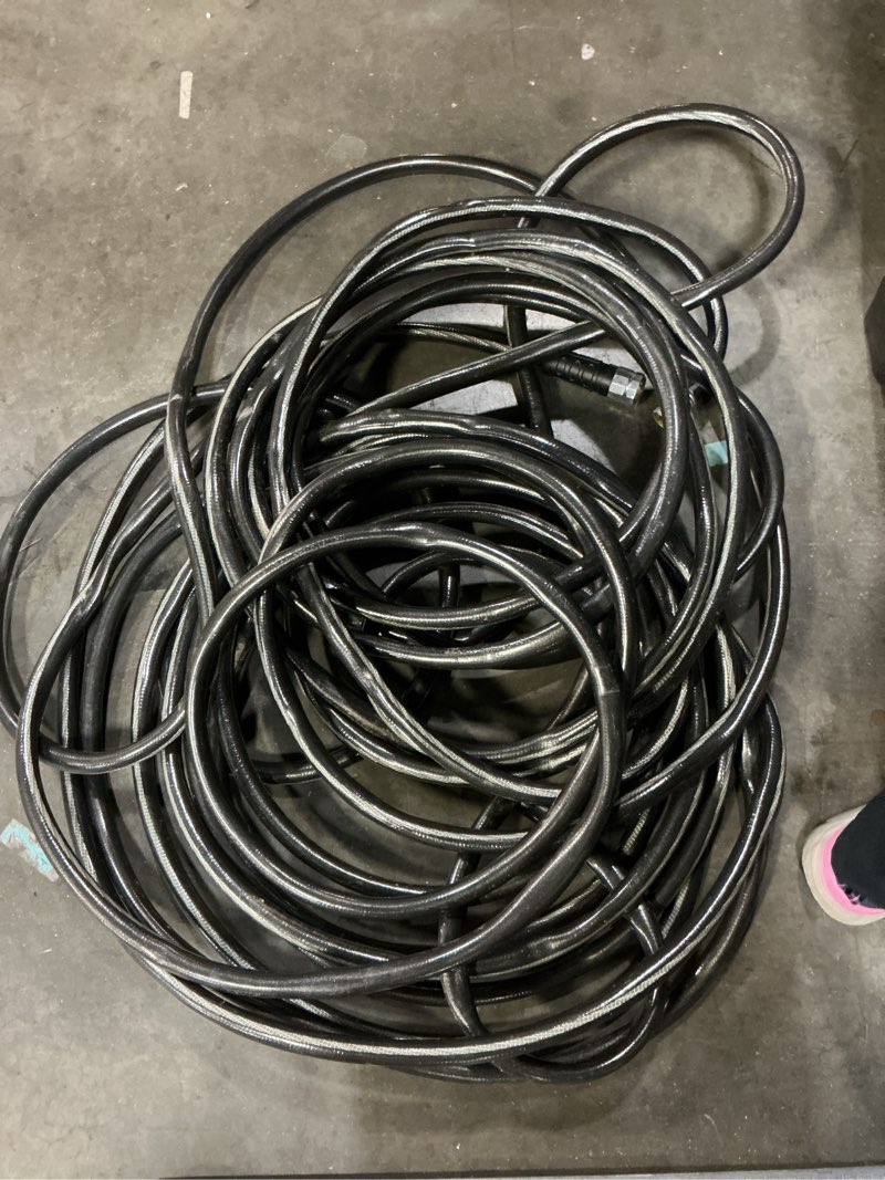 Condition photo showing As Is for neverkink teknor apex 5/8-in x 100-ft heavy-duty kink free vinyl gray coiled hose