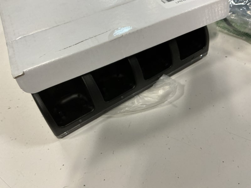 Condition photo showing As Is for Remote Controller Charger for Wii/Wii U With 4 Pack 2800mAh Rechargeable Battery Pack, 4 Port Charging Station for Controller, Remotes Not Included 7.4 * 2.1 inches Black