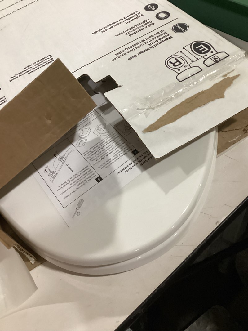 Condition photo showing New/Like New for kohler k-4774-0 brevia elongated white toilet seat with quick-release hinges and quick-attach hardware for easy clean, white