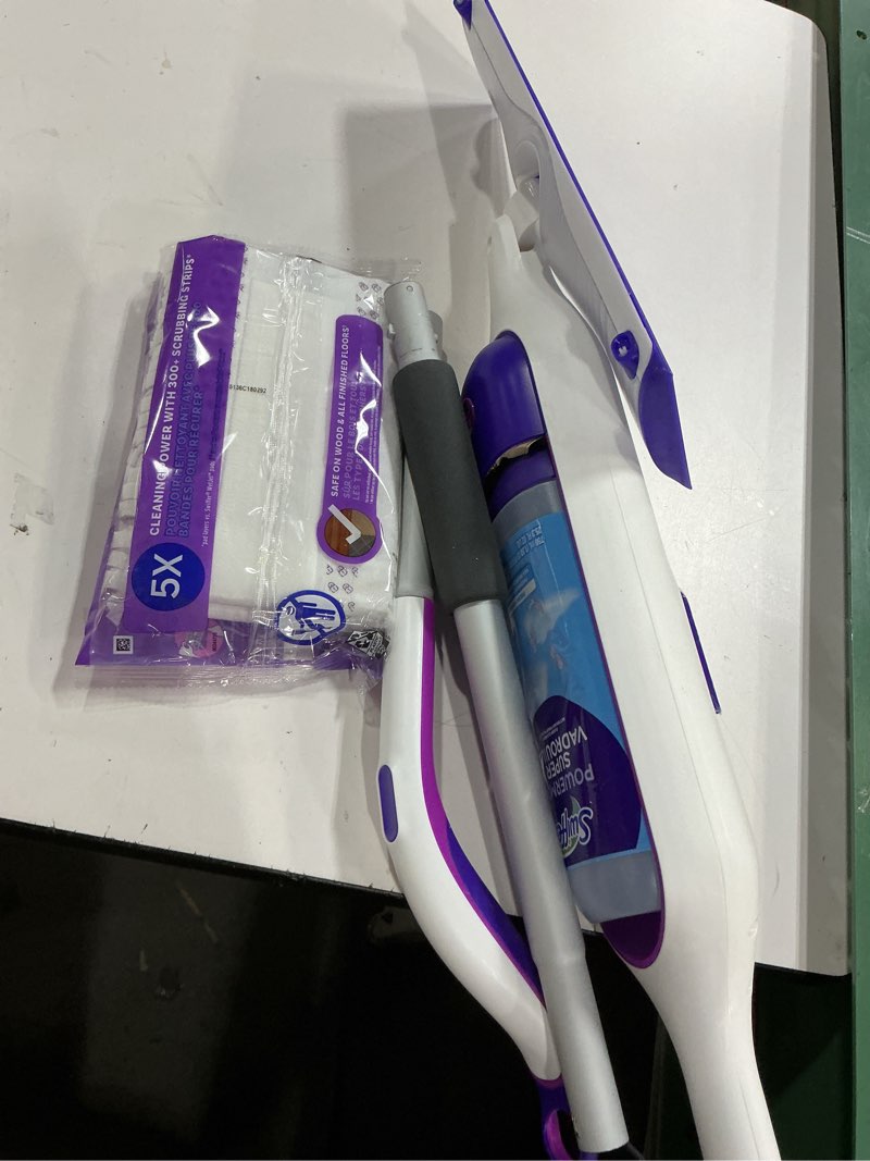 Condition photo showing Good Condition for Swiffer PowerMop Multi-Surface Mop Kit for Floor Cleaning, Includes PowerMop, 2 Mopping Pad Refills, 1 Cleaning Solution with Fresh Scent and 2 Batteries Purple and White