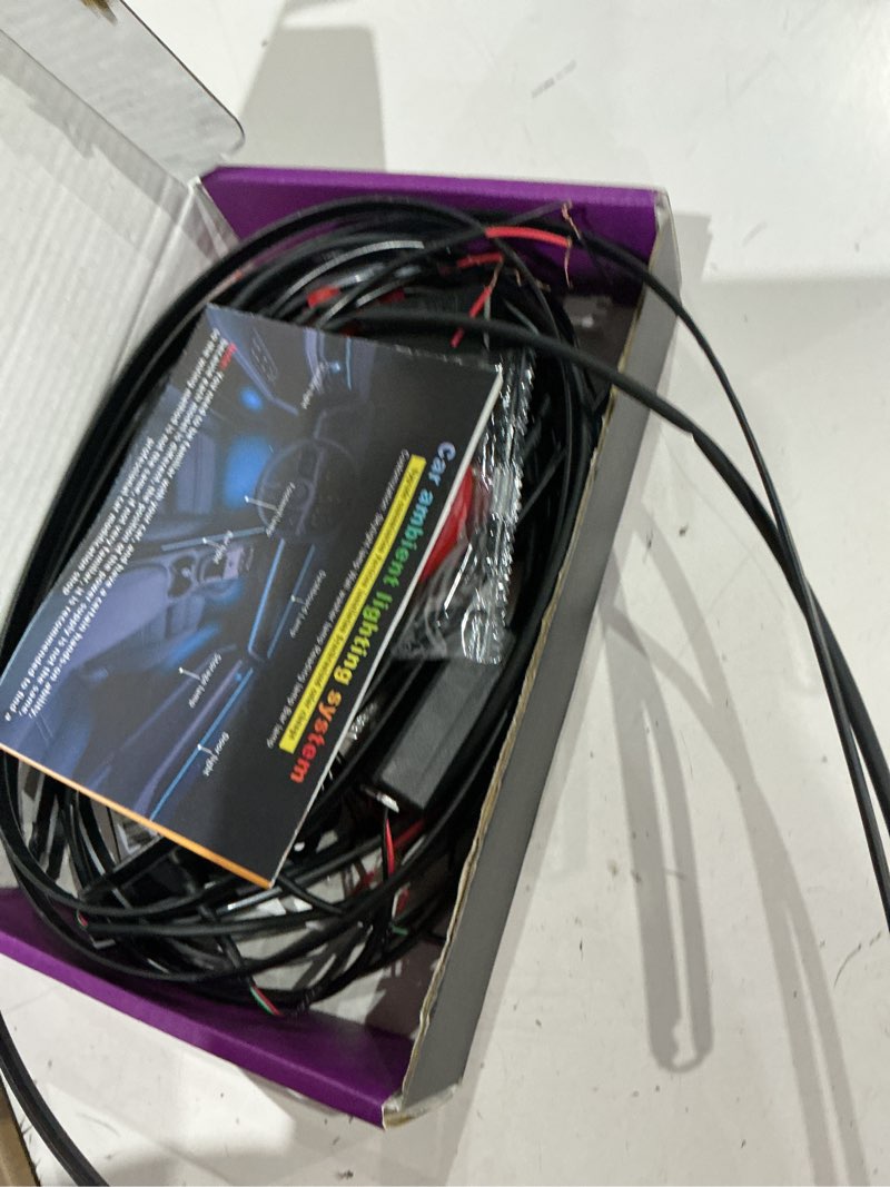 Condition photo showing As Is for dreamcolor acrylic interior car led strip light with wireless app, rgb 6 in 1 with 175 inches 593 leds fiber optic strip lights for car, dynamic chasing music sync neon car ambient lighting kits dreamcolor 6 in 1