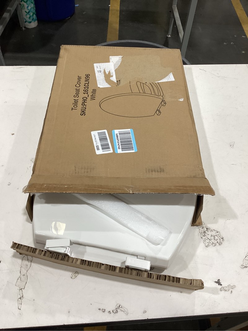 Condition photo showing Good Condition for 19" elongated toilet seat with built-in toddler seat, quiet-close potty training seat for family, quick-release & grip-tight bumpers, quick-attach hardware, white with toddler seat (quick-release) elongated (19?)