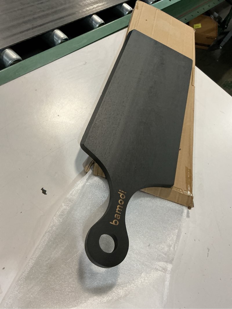 Condition photo showing Good Condition for bamodi | extra long acacia wood cutting board with round handle - versatile charcuterie and cheese board - durable wooden chopping board - elegant black design for modern kitchens - 23.6''l x 8''w