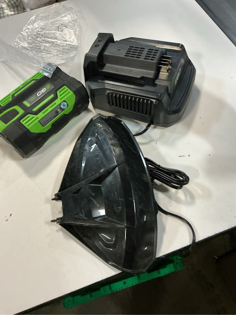 Condition photo showing As Is for ego powerload 56-volt 15-in telescopic shaft battery string trimmer 2.5 ah (battery and charger included)