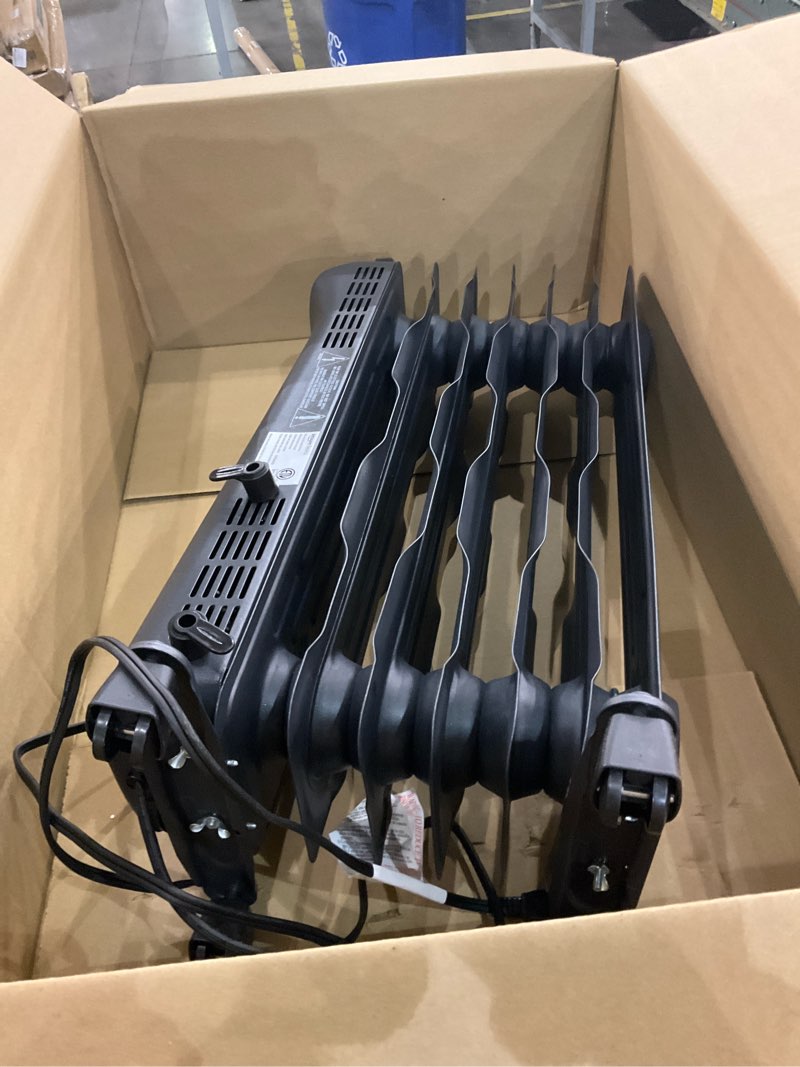 Condition photo showing Good Condition for Amazon Basics Oil Space Heater, Portable Radiator Heater with 7 Oil-Filled Fins for Indoor Use, 3 Heat Settings, Thermostat, Tip-Over Protection, ETL Safety Certificate, Manual Control, 1500W, Black