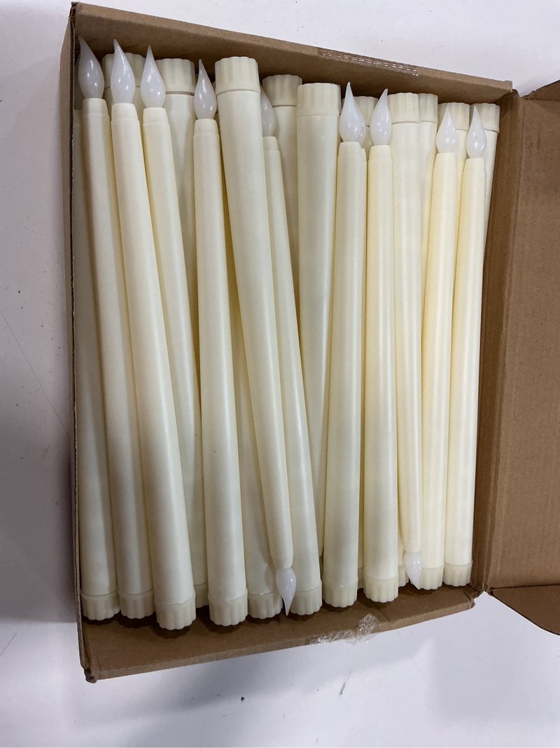 Condition photo showing Good Condition for Treela 36 Pieces Flameless Taper Candles 11 Inch Flickering Faux LED Battery Operated Electric Fake Candles for Christmas Halloween Birthday Wedding Party Supplies(Ivory) Ivory Smooth
