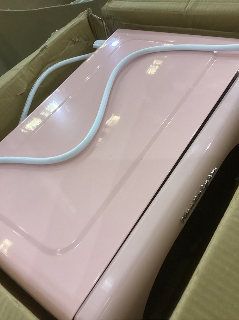 Condition photo showing As Is for Nostalgia Retro Compact Countertop Microwave Oven - 0.7 Cu. Ft. - 700-Watts with LED Digital Display - Child Lock - Easy Clean Interior - Pink Retro Classic 0.7 Cu. Ft. Pink
