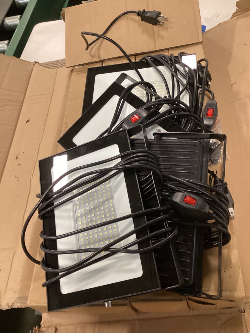 Condition photo showing As Is for LIVOWALNY 11000 lm LED Work Lights with Stand Pack of 4, 110W Adjustable Head Tower Light with 13FT Cord, Portable IP65 Waterproof Tripod Flood Light for Job Site Workshop Garage Construction Lighting 110W 11000 LM-4 Pack