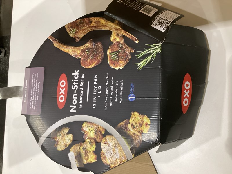 Condition photo showing As Is for OXO Enhanced, 12\\\" Frying Pan Skillet with Lid, Healthy Ceramic Nonstick, PFAS-Free, Stainless Steel Handle, Dishwasher Safe, Oven Safe, Black, 