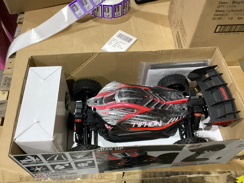 Condition photo showing New/Like New for ARRMA RC Car 1/8 Typhon 6S V5 4WD BLX Buggy with Spektrum Firma RTR (Ready-to-Run), Black and Red, ARA8606V5