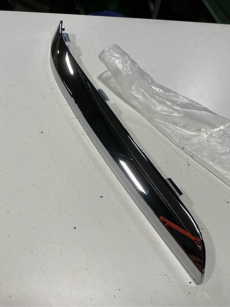 Condition photo showing Good Condition for 11-14 chrysler 300 3.6l rwd at front left bumper cover trim molding b