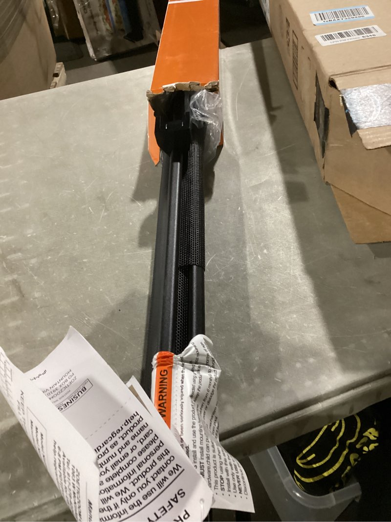 Condition photo showing As Is for veraste retractable baby gate for doorways and stairs, mesh safety gate for pet, indoor & outdoor use, one-hand operation, easy installation, 33.6" tall, expands to 55" wide?black,33.6"x55"