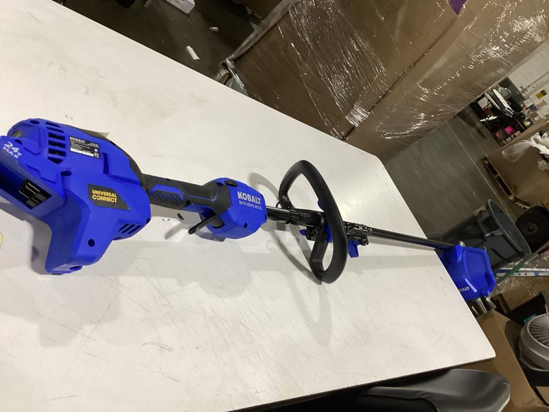 Condition photo showing New/Like New for kobalt 24 volt -12in string trimmer ( battery and charger not included)
