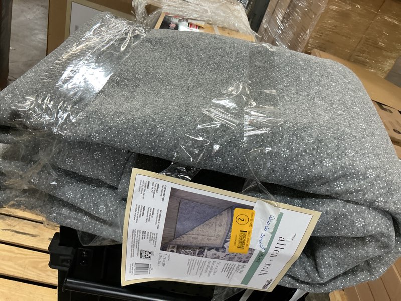 Condition photo showing As Is for allen + roth 8 x 10 (ft) rectangular polyester non-slip rug pad