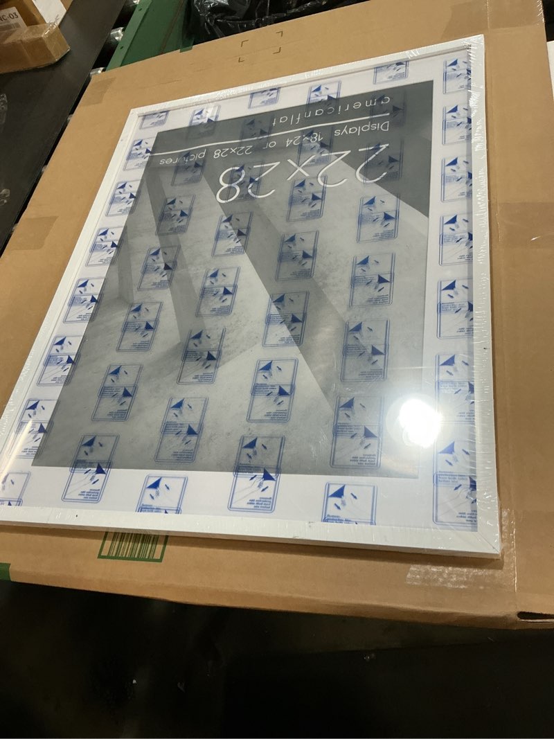 Condition photo showing Good Condition for americanflat 22x28 poster frame with polished plexiglass - use as 18x24 frame with mat or display 22x28 photo without mat - streamline collection - thin border picture frames for wall - white white 22x28 1 pack