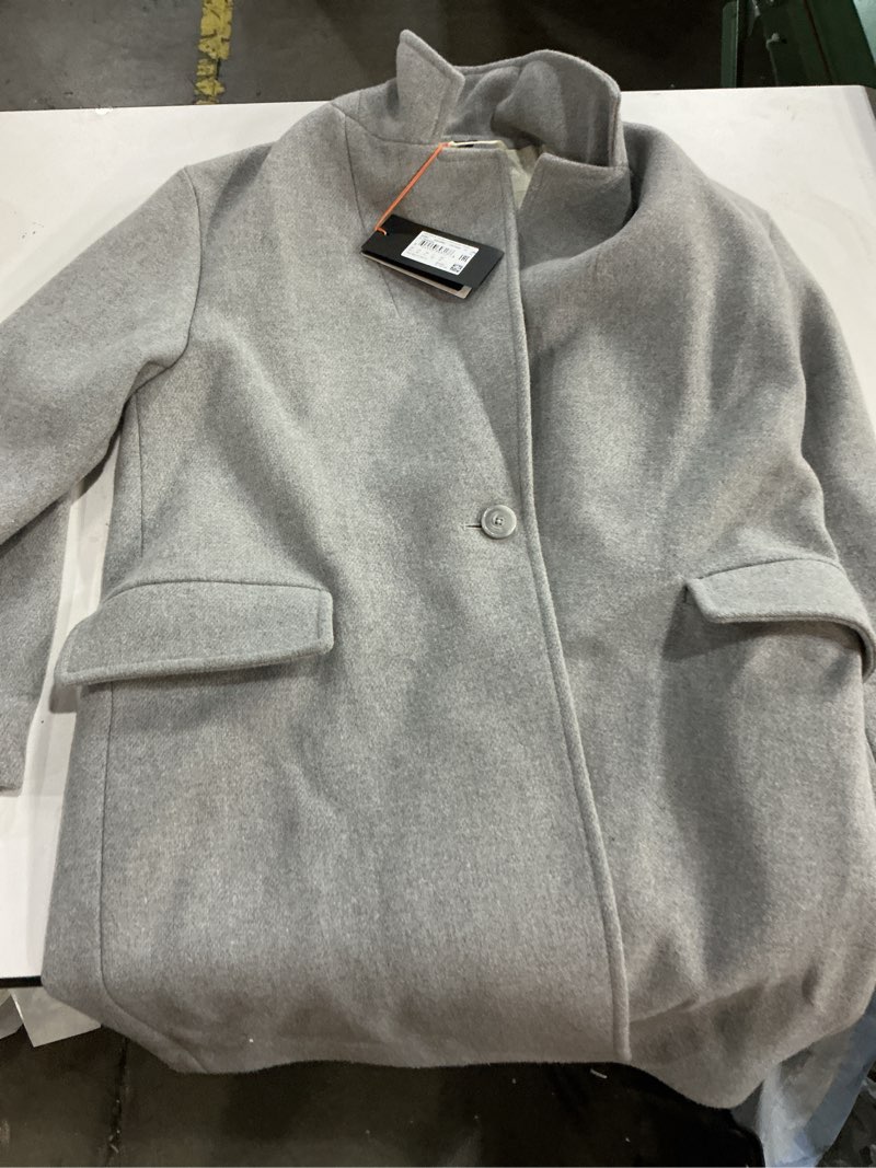 Condition photo showing Good Condition for Hugo Boss wool-blend coat featuring a light grey color and a minimalist design. (Size chart in photos)