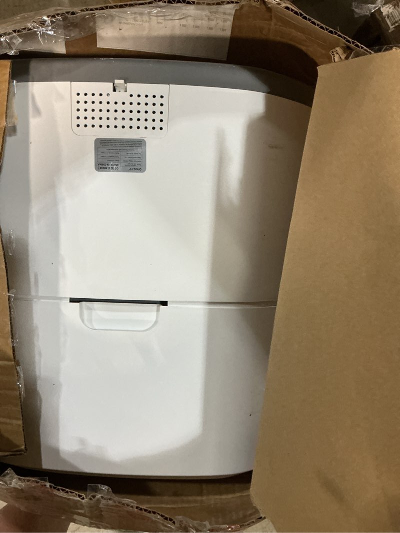 Condition photo showing As Is for oroley self cleaning litter box, large capacity automatic cat litter box with app control, safety sensors, built-in deodorizing scent box, and 1 roll garbage bags ?white off-white