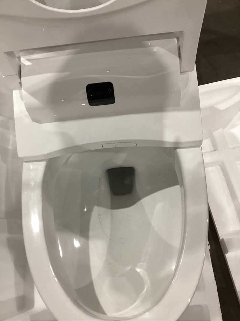 Condition photo showing As Is for woodbridge smart toilet with 1000 gram map flush score,auto open/close,foam shield,auto flush,foot sensor,movement drying,heated seat,ada chair height,one piece toilet with tank built in b0930s foam shield