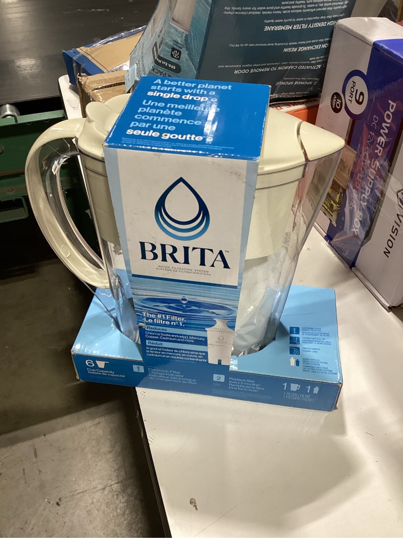 Condition photo showing New/Like New for brita space saver 6 cup water filter pitcher with 1 standard filter, beige
